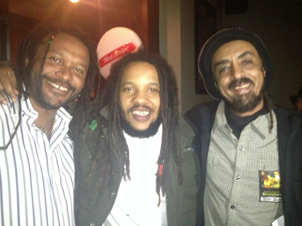 L to R: Wild Hare partner Joel McCarthy with Stephen Marley (center) and partner Asrat Sellassie this week before Marley's show at the Double Door