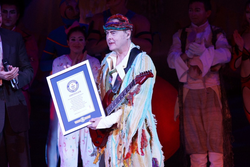 Bruce Rickerd getting certified by the Guinness Book of World Records for not missing a performance in 21 years (Courtesy of Mystere', Cirque Du Soleil)