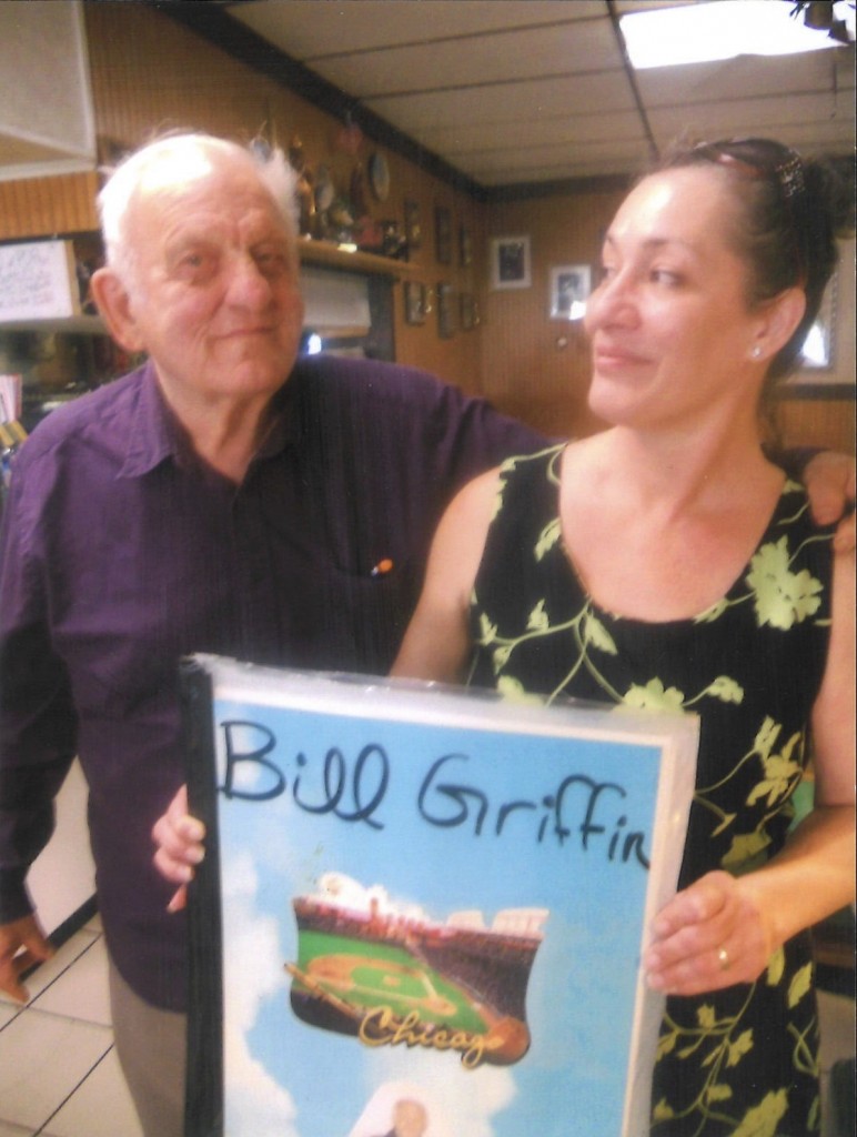 Bill, Matina Kolovos and his beloved scrapbook, 2013 (Photo by D. Hoekstra)