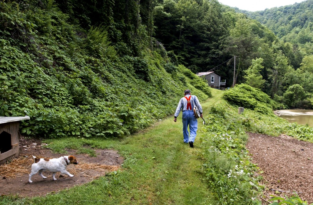 Banjo player Lee Sexton on his land in Letcher County, Ky., 2012 (Chad Stevens photo courtesy of The Daily Yonder.)